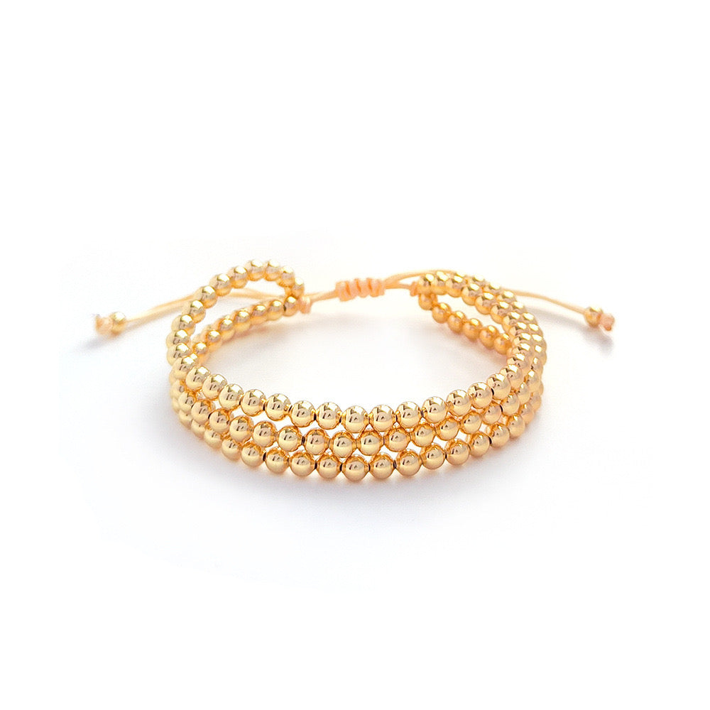 Triple Gold Bead String Bracelet